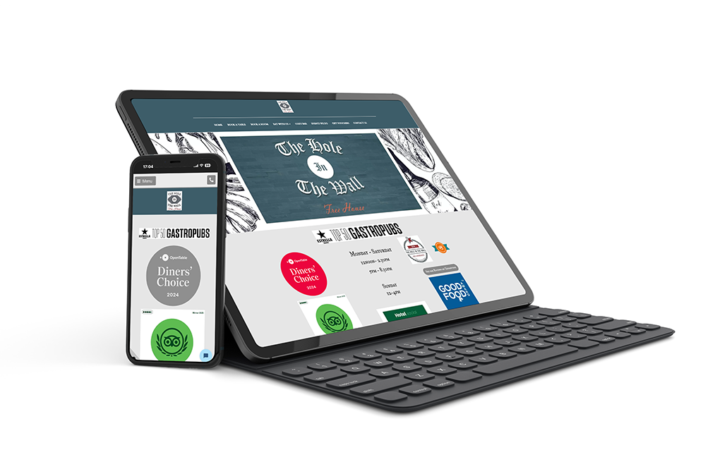 The Hole in the Wall website shown on a tablet and phone